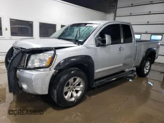 2004 Nissan Titan SE with VIN 1N6AA06B34N563205, listed as a Copart auction lot 45174795 with 222,974 mi miles and Salvage title. Bid and sale history available at DreamBid. Image 1.