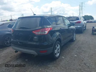 2013 Ford Escape SE with VIN 1FMCU9G95DUC56302, listed as a IAAI auction lot 42553915 with 151,390 mi miles and . Bid and sale history available at DreamBid. Image 4.