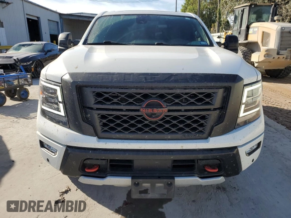 2023 Nissan Titan SV z VIN 1N6AA1ED7PN118575, wystawiony jako Copart lot #77127554 z przebiegiem 16 630 mil mil oraz Szkoda całkowita • Salvage title. Historia ofert i sprzedaży dostępna na DreamBid. Obrazek 5.