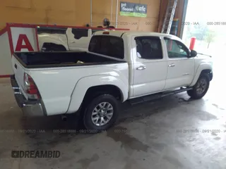 2009 Toyota Tacoma PreRunner with VIN 3TMJU62N59M083231, listed as a IAAI auction lot 28518886 with 190,324 mi miles. Bid and sale history available at carsss.com. Image 4.