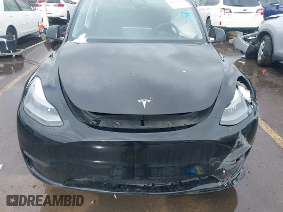 2023 Tesla Model Y Long Range with VIN 7SAYGDEE5PF766685, listed as a IAAI auction lot 41933729 with 25,959 mi miles and . Bid and sale history available at DreamBid. Image 11.