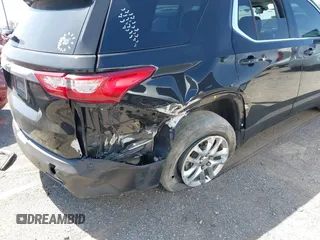 2020 Chevrolet Traverse LS z VIN 1GNERFKW0LJ172972, wystawiony jako IAAI lot #42011302 z przebiegiem 90 799 mil mil oraz . Historia ofert i sprzedaży dostępna na DreamBid. Obrazek 6.