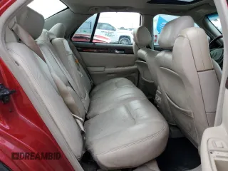 2002 Cadillac Seville Touring STS z VIN 1G6KY54902U132357, wystawiony jako Copart lot #42008795 z przebiegiem 111 014 mil mil oraz Szkoda całkowita • Salvage title. Historia ofert i sprzedaży dostępna na DreamBid. Obrazek 10.