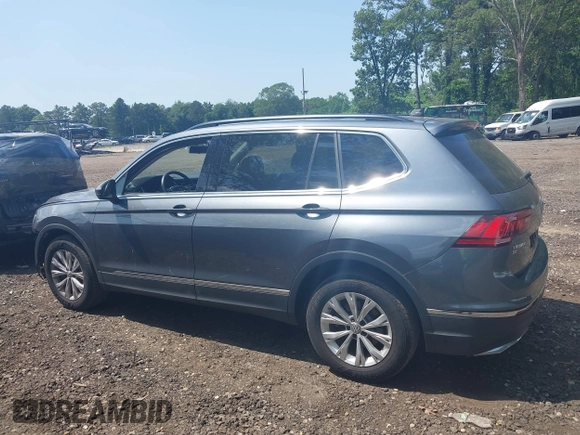 2018 Volkswagen Tiguan SEL with VIN 3VV2B7AX8JM068960, listed as a IAAI auction lot 42528062 with 84,644 mi miles and . Bid and sale history available at DreamBid. Image 14.