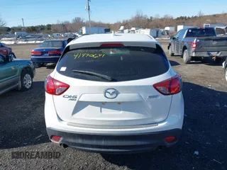 2016 Mazda CX-5 Touring with VIN JM3KE4CYXG0917841, listed as a IAAI auction lot 41420641 with 75,710 mi miles. Bid and sale history available at carsss.com. Image 16.