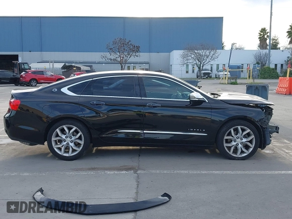2015 Chevrolet Impala LTZ with VIN 1G1155SLXFU135717, listed as a IAAI auction lot 41242363 with 249,449 mi miles and . Bid and sale history available at DreamBid. Image 14.