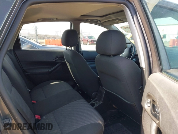 2007 Ford Focus S z VIN 1FAHP37N17W316344, wystawiony jako IAAI lot #41882805 z przebiegiem 262 422 mil mil oraz . Historia ofert i sprzedaży dostępna na DreamBid. Obrazek 8.
