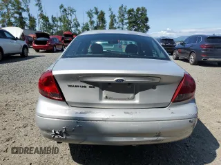 2005 Ford Taurus SE с VIN 1FAFP53U05A259841, выставлен на аукционе Copart как лот 57255835 с пробегом 179 821 миль миль и Списание • Salvage title. История ставок и продаж доступна на DreamBid. Изображение 6.