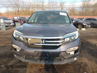 2016 Honda Pilot EX-L with VIN 5FNYF6H75GB053780, listed as a IAAI auction lot 41340590 with 203,190 mi miles. Bid and sale history available at carsss.com. Image 12.