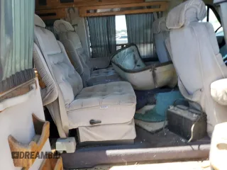 1994 Chevrolet Chevy Van z VIN 1GBEG25K9RF176079, wystawiony jako Copart lot #65824634 z przebiegiem 180 507 mil mil oraz Czysty tytuł • Clean title. Historia ofert i sprzedaży dostępna na DreamBid. Obrazek 11.