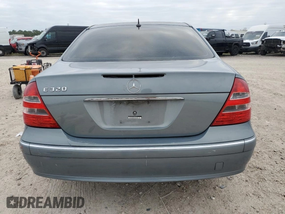 2005 Mercedes-Benz E-Class 3.2L with VIN WDBUF65J25A655040, listed as a Copart auction lot 87414674 with 147,847 mi miles and Salvage Title. Bid and sale history available at carsss.com. Image 6.
