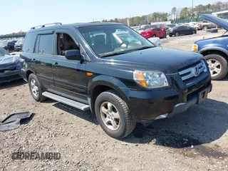 2007 Honda Pilot EX-L with VIN 2HKYF18537H502361, listed as a IAAI auction lot 42039836 with 167,431 mi miles. Bid and sale history available at carsss.com. Image 1.