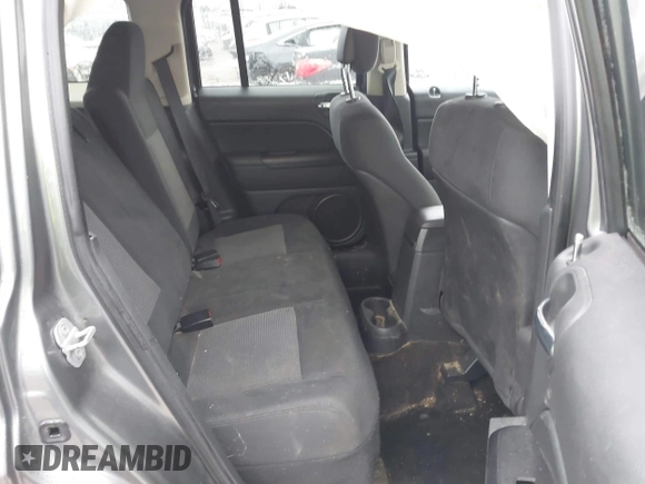 2013 Jeep Patriot Latitude with VIN 1C4NJPFB8DD218948, listed as a IAAI auction lot 41072937 with 126,140 mi miles and . Bid and sale history available at carsss.com. Image 8.