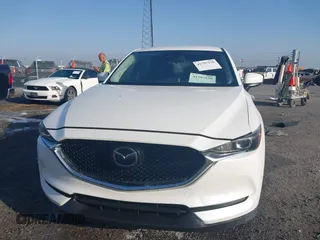 2019 Mazda CX-5 Touring z VIN JM3KFACM0K1564330, wystawiony jako IAAI lot #41797276 z przebiegiem 112 100 mil mil oraz . Historia ofert i sprzedaży dostępna na DreamBid. Obrazek 12.