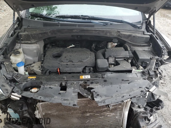2017 Hyundai Santa Fe 2.4L z VIN 5NMZU3LB8HH032409, wystawiony jako Copart lot #57939915 z przebiegiem 105 494 mil mil oraz Szkoda całkowita • Salvage title. Historia ofert i sprzedaży dostępna na DreamBid. Obrazek 11.