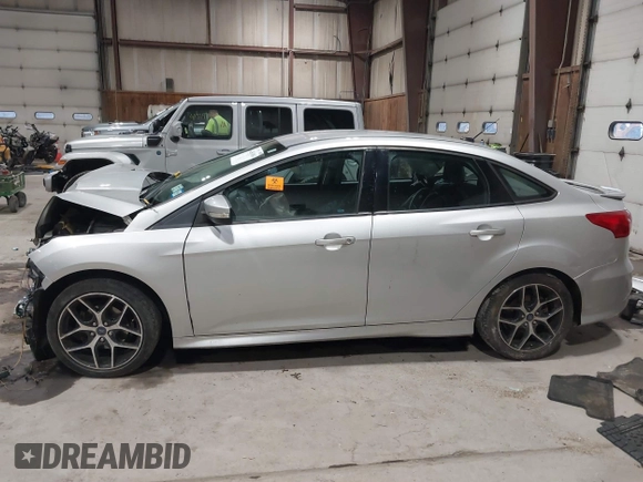 2015 Ford Focus SE with VIN 1FADP3F24FL272863, listed as a IAAI auction lot 41561084 with 103,875 mi miles. Bid and sale history available at carsss.com. Image 15.