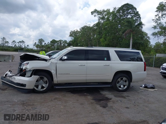 2015 Chevrolet Suburban LTZ with VIN 1GNSKKKC4FR687923, listed as a IAAI auction lot 42192062 with 139,873 mi miles and . Bid and sale history available at DreamBid. Image 14.
