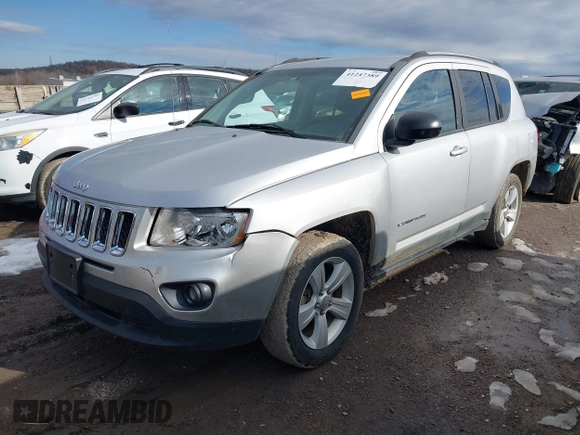 2011 Jeep Compass with VIN 1J4NT1FB4BD252724, listed as a IAAI auction lot 41247389 with 162,028 mi miles. Bid and sale history available at carsss.com. Image 2.