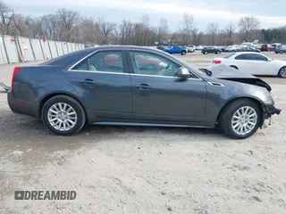 2012 Cadillac CTS Luxury z VIN 1G6DE5E51C0112608, wystawiony jako IAAI lot #41656992 z przebiegiem Nie podano mil oraz . Historia ofert i sprzedaży dostępna na DreamBid. Obrazek 13.