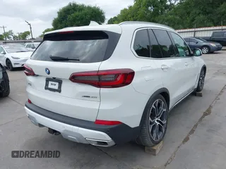 2023 BMW X5 xDrive40i with VIN 5UXCR6C04P9P15756, listed as a IAAI auction lot 42030023 with 40,280 mi miles and . Bid and sale history available at DreamBid. Image 4.