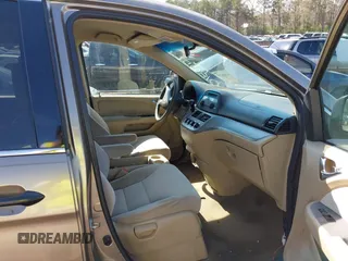 2010 Honda Odyssey LX with VIN 5FNRL3H25AB018051, listed as a IAAI auction lot 41886393 with 256,554 mi miles. Bid and sale history available at carsss.com. Image 5.