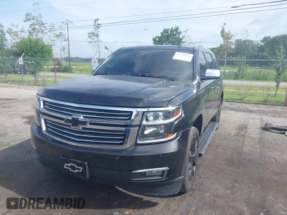 2015 Chevrolet Tahoe LTZ with VIN 1GNSCCKC5FR103676, listed as a IAAI auction lot 42456913 with 214,009 mi miles and . Bid and sale history available at DreamBid. Image 6.