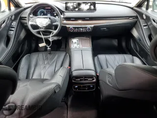 2023 Genesis G80 z VIN KMTGE4S18PU006369, wystawiony jako Copart lot #57445225 z przebiegiem 25 083 mil mil oraz Szkody całkowita. Historia ofert i sprzedaży dostępna na DreamBid. Obrazek 8.
