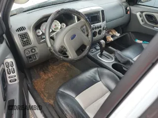 2005 Ford Escape Hybrid with VIN 1FMCU95H95KC74177, listed as a Copart auction lot 77361724 with 195,199 mi miles and Salvage title. Bid and sale history available at DreamBid. Image 8.
