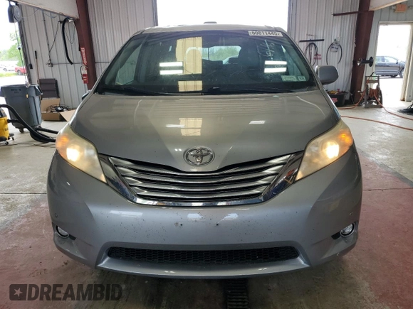2011 Toyota Sienna XLE with VIN 5TDDK3DC7BS022837, listed as a Copart auction lot 60811445 with 210,732 mi miles and Salvage title. Bid and sale history available at DreamBid. Image 5.