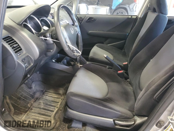 2007 Honda Fit Sport with VIN JHMGD37637S055263, listed as a Copart auction lot 65892135 with 347,782 mi miles and Salvage title. Bid and sale history available at DreamBid. Image 7.