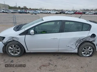 2010 Honda Insight EX with VIN JHMZE2H71AS035091, listed as a IAAI auction lot 41380128 with 181,653 mi miles and . Bid and sale history available at DreamBid. Image 15.