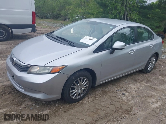2012 Honda Civic LX with VIN 2HGFB2F59CH570602, listed as a IAAI auction lot 42241041 with 134,134 mi miles and . Bid and sale history available at DreamBid. Image 2.