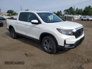 2023 Honda Ridgeline RTL with VIN 5FPYK3F53PB067003, listed as a Copart auction lot 58384895 with 31,983 mi miles and Salvage title. Bid and sale history available at DreamBid. Image 4.