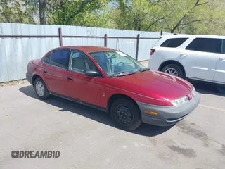 1996 Saturn SL with VIN 1G8ZG5289TZ214790, listed as a IAAI auction lot 42090262 with 197,485 mi miles. Bid and sale history available at carsss.com. Image 1.