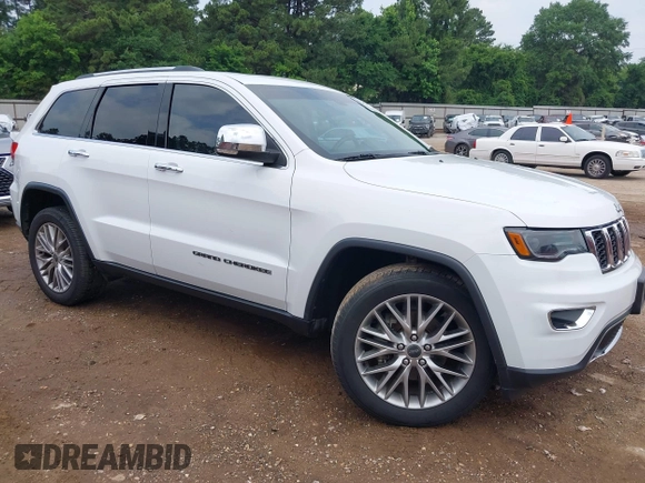 2018 Jeep Grand Cherokee Sterling with VIN 1C4RJEBG8JC289169, listed as a IAAI auction lot 42267113 with 77,274 mi miles and . Bid and sale history available at DreamBid. Image 1.