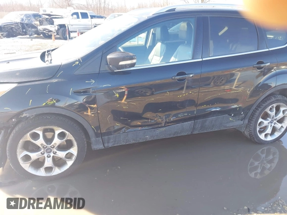 2015 Ford Escape Titanium with VIN 1FMCU9J91FUC68152, listed as a IAAI auction lot 41620725 with 195,122 mi miles. Bid and sale history available at carsss.com. Image 6.