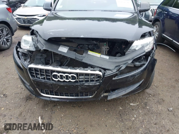 2015 Audi Q7 Premium Plus with VIN WA1LGAFEXFD028885, listed as a IAAI auction lot 42619526 with 145,126 mi miles and . Bid and sale history available at DreamBid. Image 6.