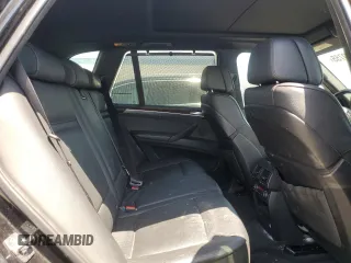 2012 BMW X5 35i z VIN 5UXZV4C51CL744313, wystawiony jako Copart lot #58270755 z przebiegiem 97 903 mil mil oraz Szkoda całkowita • Salvage title. Historia ofert i sprzedaży dostępna na DreamBid. Obrazek 10.