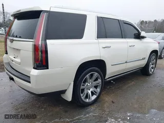 2015 Cadillac Escalade Premium with VIN 1GYS4NKJ9FR547587, listed as a IAAI auction lot 41556378 with 155,038 mi miles. Bid and sale history available at carsss.com. Image 4.