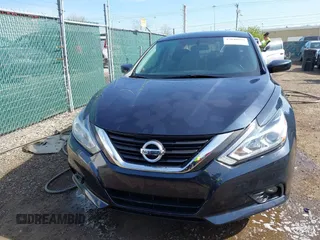 2016 Nissan Altima SR with VIN 1N4AL3AP1GC204703, listed as a IAAI auction lot 42040016 with 88,304 mi miles and . Bid and sale history available at DreamBid. Image 12.