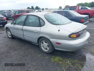 1997 Ford Taurus GL z VIN 1FALP52UXVG180596, wystawiony jako IAAI lot #42463461 z przebiegiem 190 419 mil mil oraz . Historia ofert i sprzedaży dostępna na DreamBid. Obrazek 3.