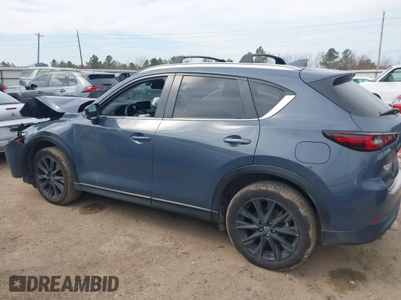 2023 Mazda CX-5 S Carbon Edition z VIN JM3KFBCM6P0288402, wystawiony jako IAAI lot #41682386 z przebiegiem 30 482 mil mil oraz . Historia ofert i sprzedaży dostępna na DreamBid. Obrazek 14.