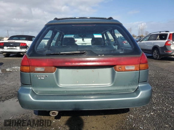1995 Subaru Legacy L with VIN 4S3BK6358S6352272, listed as a Copart auction lot 46073325 with 211,502 mi miles and Salvage title. Bid and sale history available at DreamBid. Image 6.