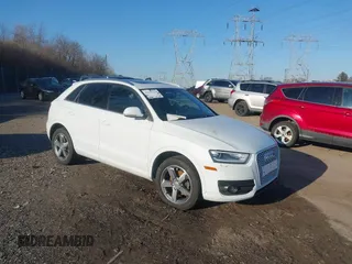 2015 Audi Q3 2.0T Premium Plus with VIN WA1EFCFS9FR012788, listed as a IAAI auction lot 41655224 with 129,080 mi miles. Bid and sale history available at carsss.com. Image 1.