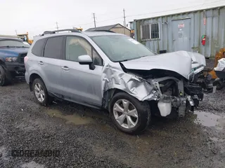 2014 Subaru Forester 2.5i Premium with VIN JF2SJAEC4EH542243, listed as a IAAI auction lot 41858364 with 100,095 mi miles. Bid and sale history available at carsss.com. Image 1.