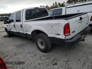 2002 Ford F-250 XL with VIN 1FTNW20F02EA79793, listed as a Copart auction lot 84667074 with Not Provided miles and Salvage Title. Bid and sale history available at DreamBid. Image 2.