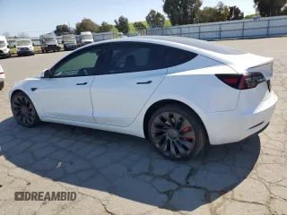 2021 Tesla Model 3 Performance with VIN 5YJ3E1EC5MF077493, listed as a Copart auction lot 48067045 with 44,285 mi miles and Salvage Title. Bid and sale history available at DreamBid. Image 2.