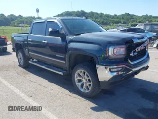 2018 GMC Sierra 1500 SLT with VIN 3GTU2NEC3JG298259, listed as a IAAI auction lot 42584853 with 94,730 mi miles and . Bid and sale history available at DreamBid. Image 1.