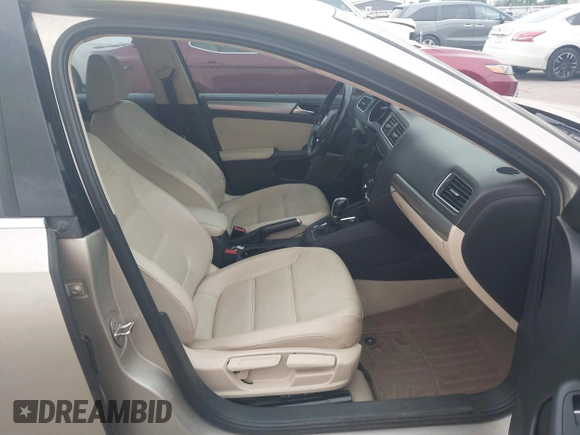 2015 Volkswagen Jetta Sedan 1.8T SE w/Connectivity with VIN 3VWD07AJ0FM231873, listed as a IAAI auction lot 42142327 with 156,230 mi miles. Bid and sale history available at carsss.com. Image 5.