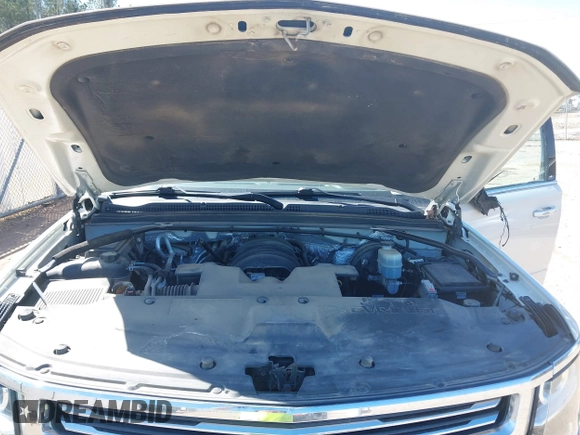 2015 Chevrolet Suburban LTZ with VIN 1GNSCKKC3FR113388, listed as a IAAI auction lot 41867964 with 238,530 mi miles and . Bid and sale history available at DreamBid. Image 10.